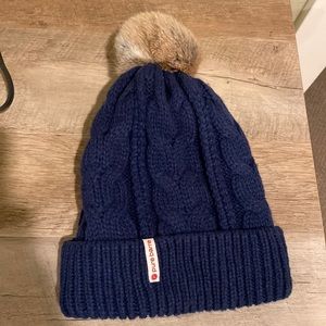 EUC pure barre blue faux fur beanie hat.